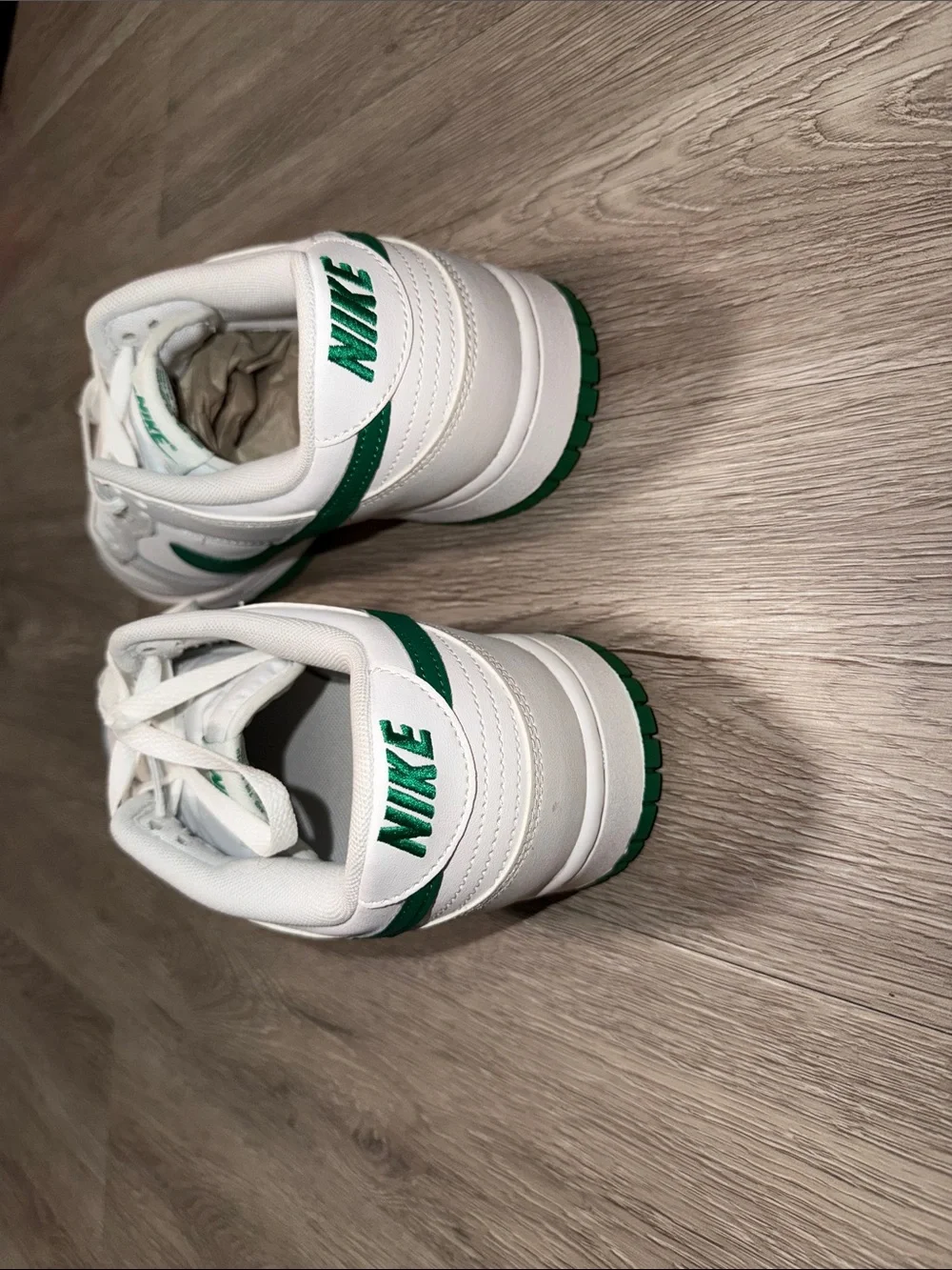 Nike White Low-Top Sneakers with Green Swoosh